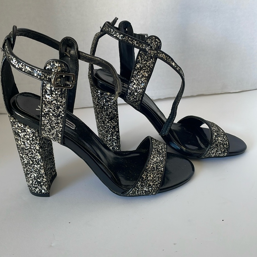 NWT Gorgeous Brand New Sandals with Black Shimmers.